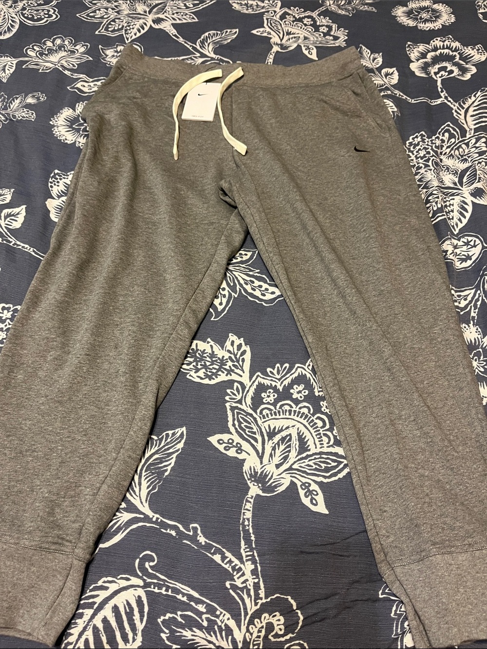 Nike Kids Grey Jogger Sweatpants with White Drawstring
